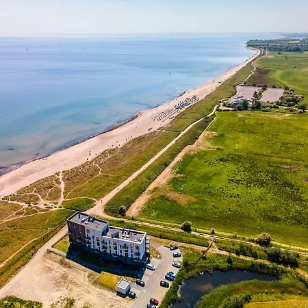 Daire Beachterracefour- Eg, Meerblick, Terrasse, Kamin, Sauna