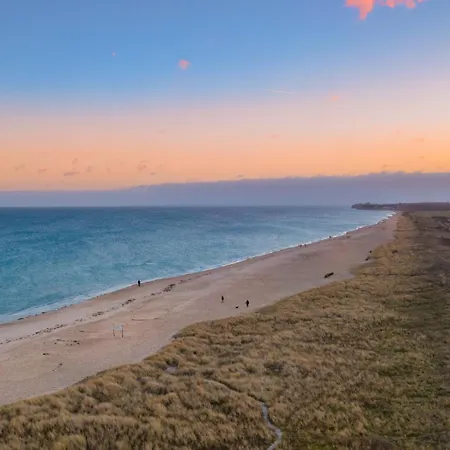 Beachterracefour- Eg, Meerblick, Terrasse, Kamin, Sauna Apartman